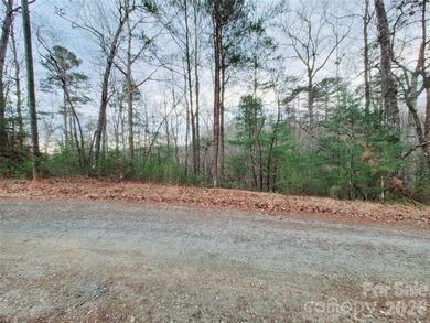 Tucked inside the gated community of Riverbend at Lake Lure