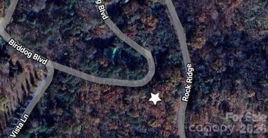 Tucked inside the gated community of Riverbend at Lake Lure