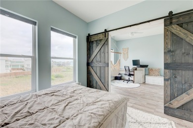 This spacious 3-story condo is the ultimate beach retreat