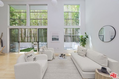 Experience elevated coastal living in this stunning - photo 1
