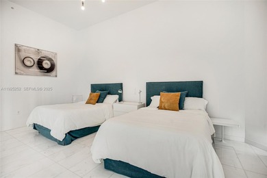 Experience the ultimate in luxury living in Coconut Grove with