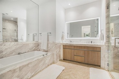 Experience the ultimate in luxury living in Coconut Grove with