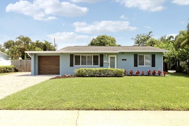 Completely remodeled 3-bedroom, 2-bath home in North Palm Beach! - photo 1
