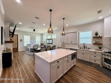 Experience elevated coastal living in this beautifully appointed - photo 9