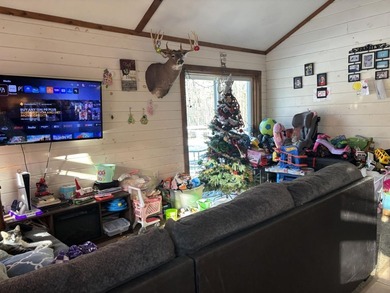 This charming single-level home, built in 1995, features three - photo 7