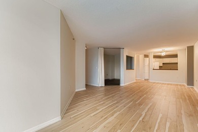 Welcome to Unit 401 at 6500 Woodlake Drive, an inviting - photo 2