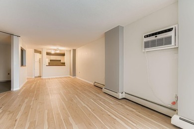 Welcome to Unit 401 at 6500 Woodlake Drive, an inviting - photo 3