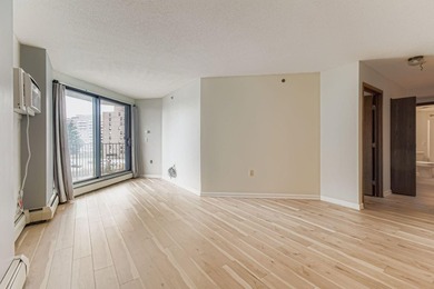 Welcome to Unit 401 at 6500 Woodlake Drive, an inviting - photo 5