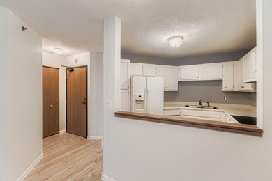 Welcome to Unit 401 at 6500 Woodlake Drive, an inviting - photo 9