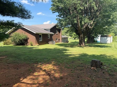 Welcome to this well-maintained 4-bedroom, 2-bathroom - photo 13