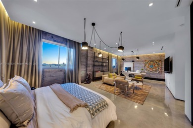 Atico Wynwood is a one-of-a-kind, two-level live/work penthouse