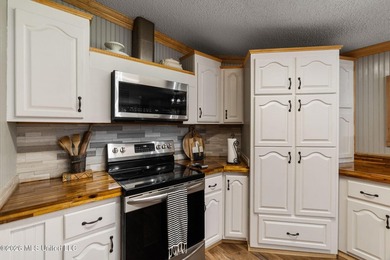 On nearly 20 acres, this beautifully remodeled 3 bed 3 bath home - photo 6
