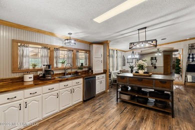 On nearly 20 acres, this beautifully remodeled 3 bed 3 bath home - photo 7