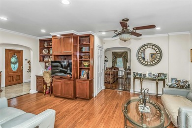 Set on a manicured corner lot in Bayside, this expanded Colonial - photo 13