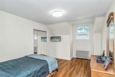 Set on a manicured corner lot in Bayside, this expanded Colonial - photo 18