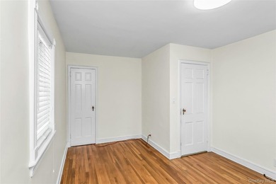 Set on a manicured corner lot in Bayside, this expanded Colonial - photo 19