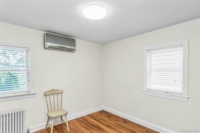 Set on a manicured corner lot in Bayside, this expanded Colonial - photo 20