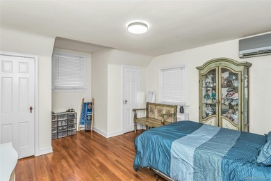 Set on a manicured corner lot in Bayside, this expanded Colonial - photo 21