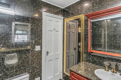 Set on a manicured corner lot in Bayside, this expanded Colonial - photo 23