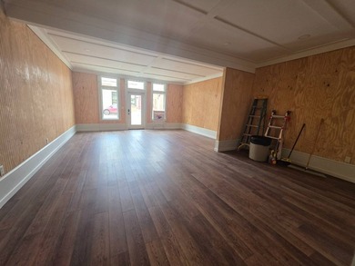 Seller has made a complete transformation at 112 E 1st St - photo 3