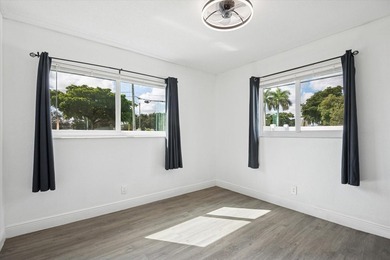 All remodeled with a new open kitchen and large impact sliders - photo 13