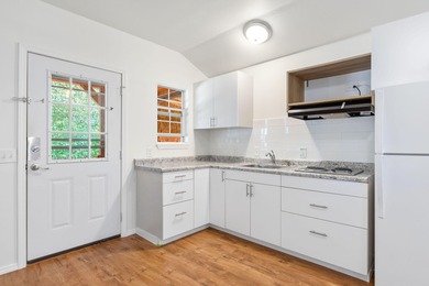 TWO homes for the price of ONE! The main home, custom built in