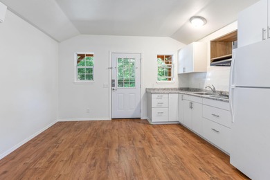 TWO homes for the price of ONE! The main home, custom built in