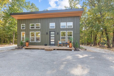 TWO homes for the price of ONE! The main home, custom built in