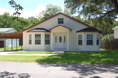 This new renovated two-story home is tucked away on a street - photo 1