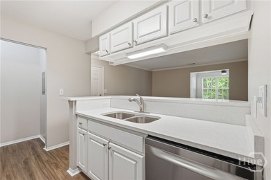 Beautifully Renovated Condo with Coastal Charm & Exceptional - photo 8