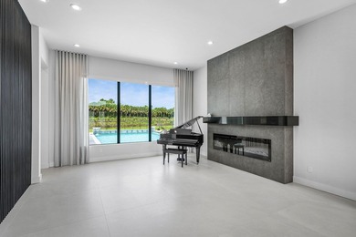Nestled behind the prestigious gates of Boca Bridges, this - photo 6