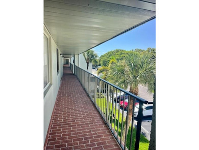 Welcome to this charming two-bedroom, two-bathroom condominium - photo 3