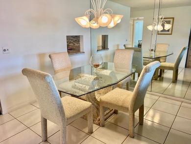 Welcome to this charming two-bedroom, two-bathroom condominium - photo 5