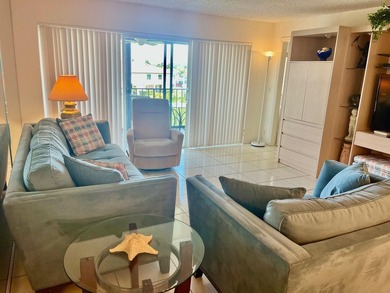 Welcome to this charming two-bedroom, two-bathroom condominium - photo 7