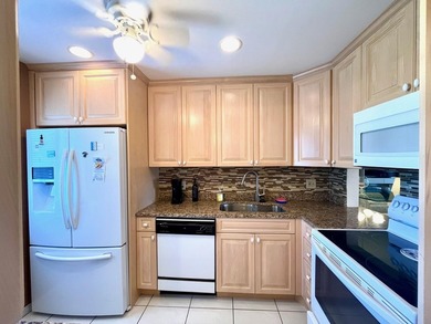 Welcome to this charming two-bedroom, two-bathroom condominium - photo 10
