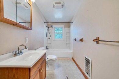 This one-level brick ranch offers plenty of potential and is - photo 21