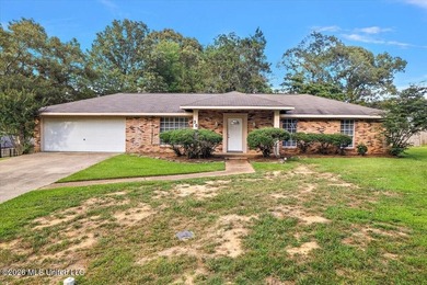 Welcome to this charming 3-bedroom, 2-bath home nestled in the - photo 1