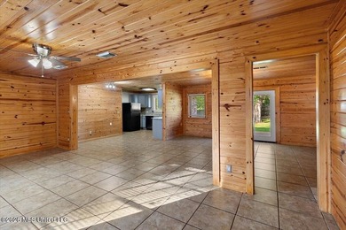 Welcome to this charming 3-bedroom, 2-bath home nestled in the - photo 3