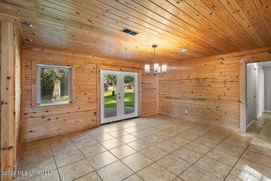 Welcome to this charming 3-bedroom, 2-bath home nestled in the - photo 4
