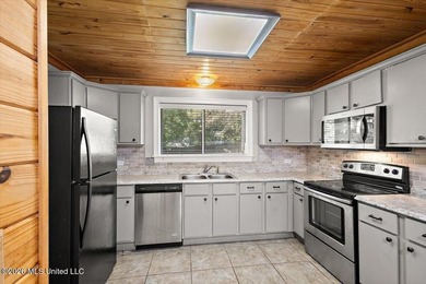Welcome to this charming 3-bedroom, 2-bath home nestled in the - photo 5