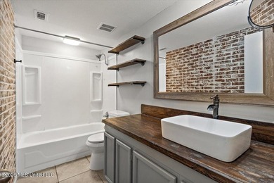 Welcome to this charming 3-bedroom, 2-bath home nestled in the - photo 8