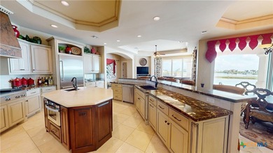 Located on the tranquil shores of the gated community of The - photo 11