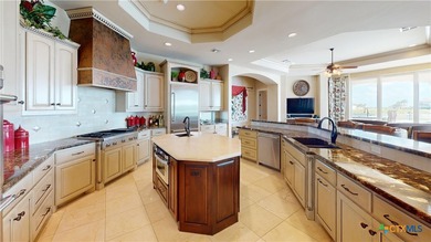 Located on the tranquil shores of the gated community of The - photo 12