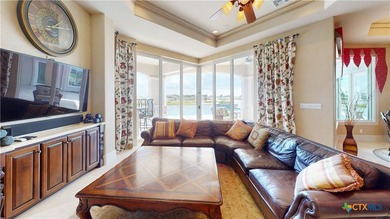 Located on the tranquil shores of the gated community of The - photo 15