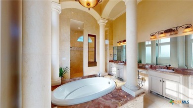 Located on the tranquil shores of the gated community of The - photo 19