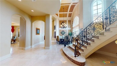 Located on the tranquil shores of the gated community of The - photo 21