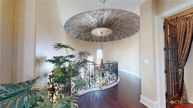 Located on the tranquil shores of the gated community of The - photo 22