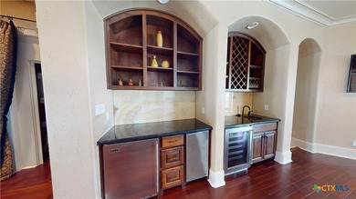 Located on the tranquil shores of the gated community of The - photo 23