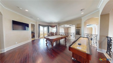 Located on the tranquil shores of the gated community of The - photo 24
