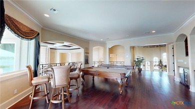 Located on the tranquil shores of the gated community of The - photo 25
